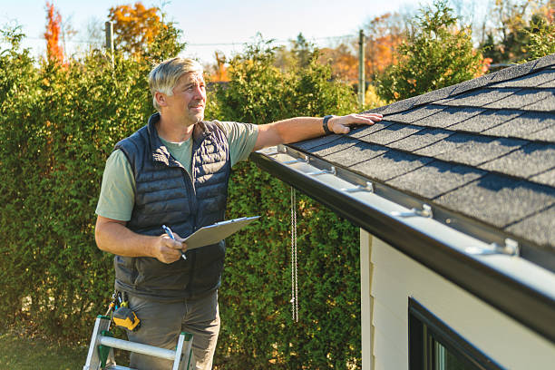 Professional Roofing technician working in Devers, TX